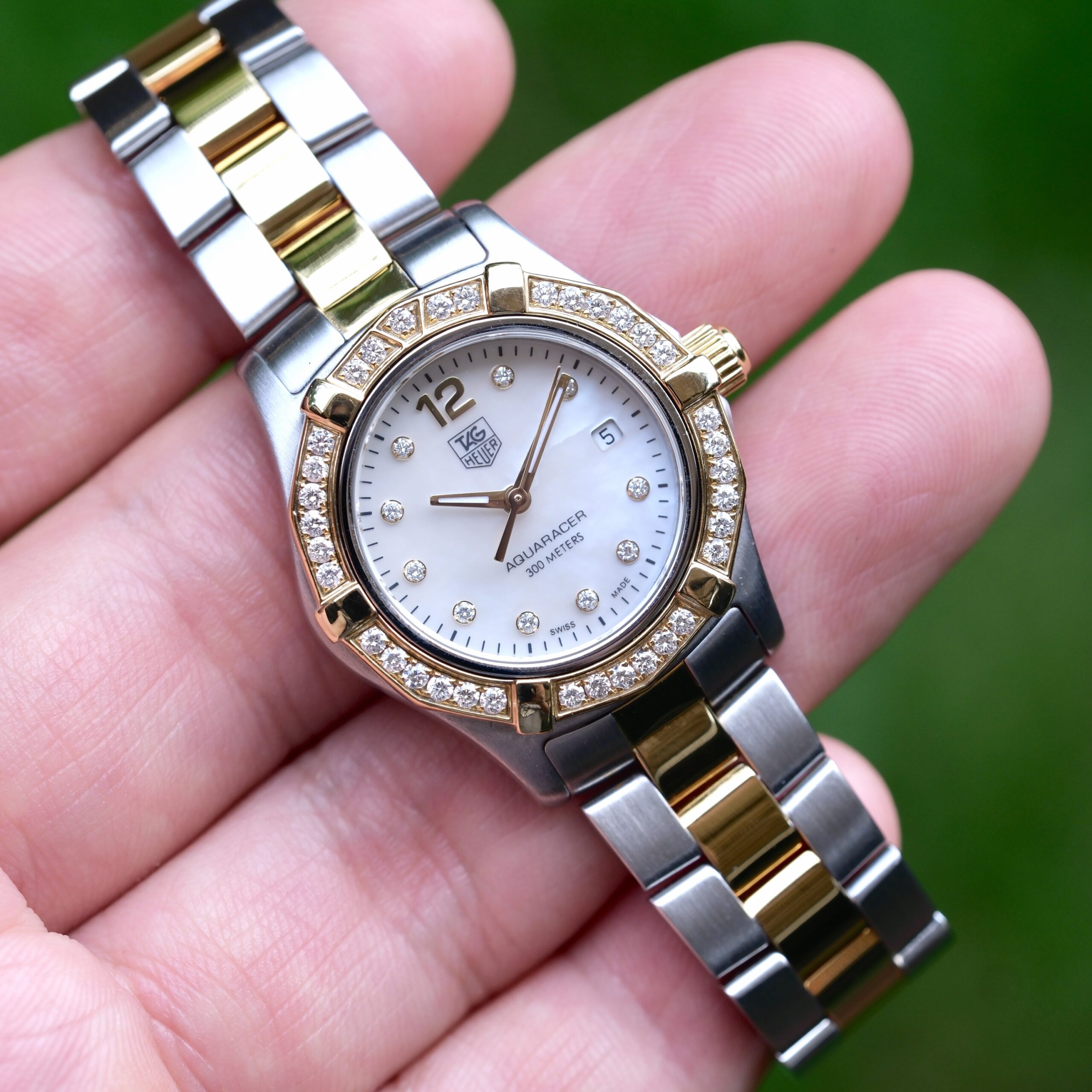 2013 TAG HEUER Aquaracer Lady Quartz Diamond 27mm White Mother of Pearl Dial Solid 18K Gold Diamond Bezel Ref. WAF1450 HERO